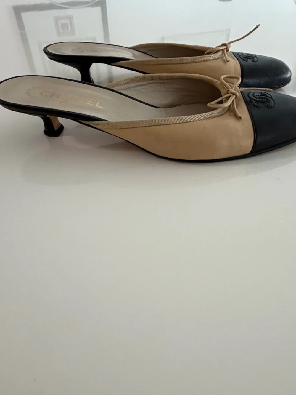 CHANEL Beige and Black Leather Bow-Trim Slip-On Mules
